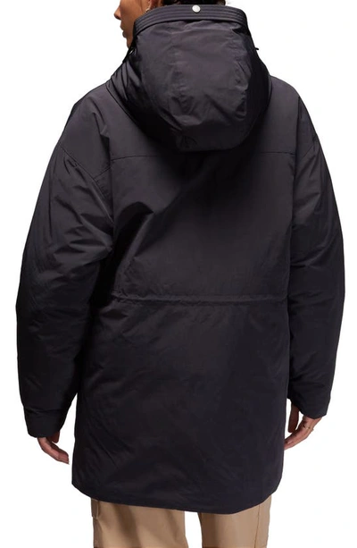 Shop Jordan Storm-fit Water Resistant Hooded Down Parka In Black
