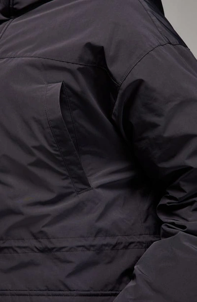 Shop Jordan Storm-fit Water Resistant Hooded Down Parka In Black