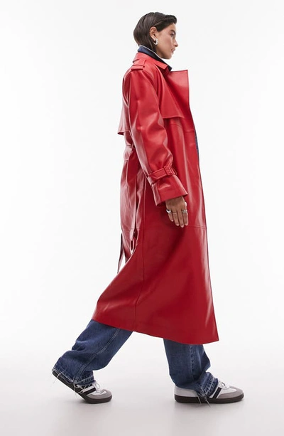 Shop Topshop Belted Faux Leather Trench Coat In Red
