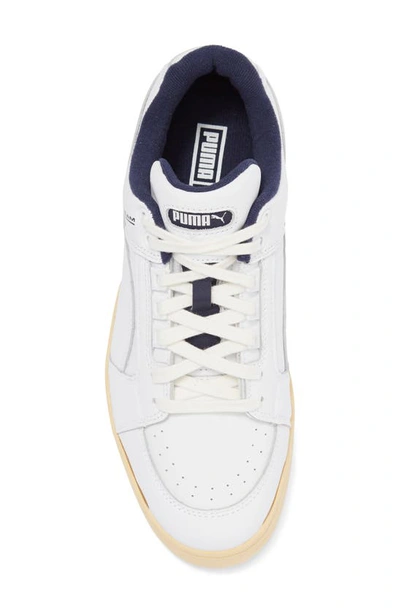Shop Puma Slipstream Lo The Neverworn Ii Sneaker In  White-new Navy-straw