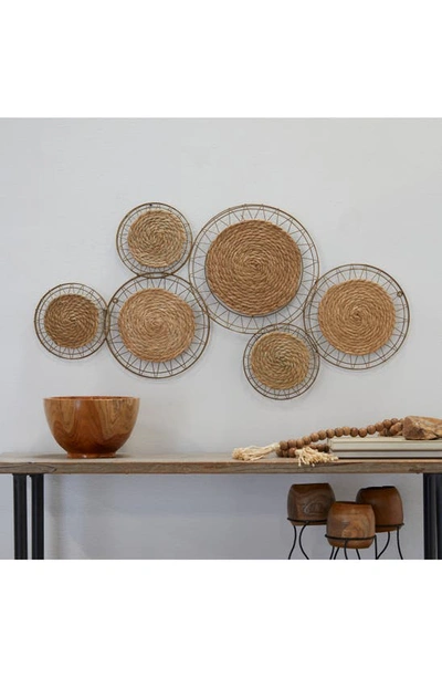 Shop Uma Woven Disc Wall Hanging In Brown