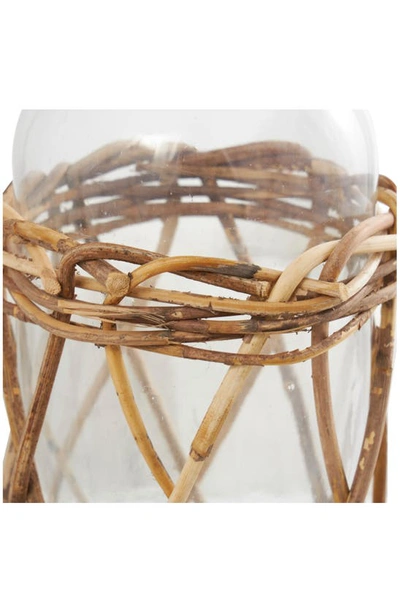 Shop Uma Tall Rattan Woven Glass Vase In Clear