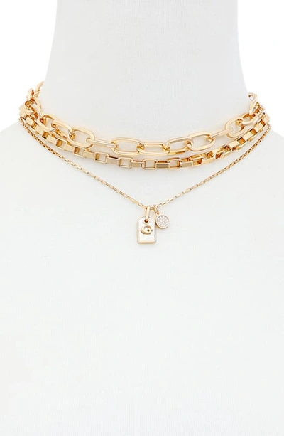 Shop Guess Logo Dog Tag Layered Necklace In Gold Tone