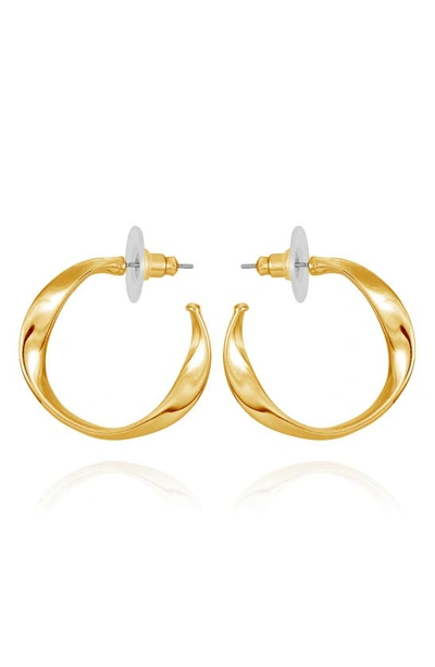 Shop T Tahari Twisted Hoop Earrings In Goldtone