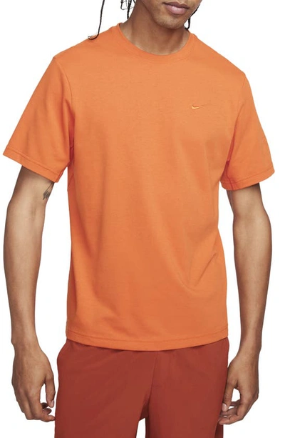 Shop Nike Primary Training Dri-fit Short Sleeve T-shirt In Campfire Orange