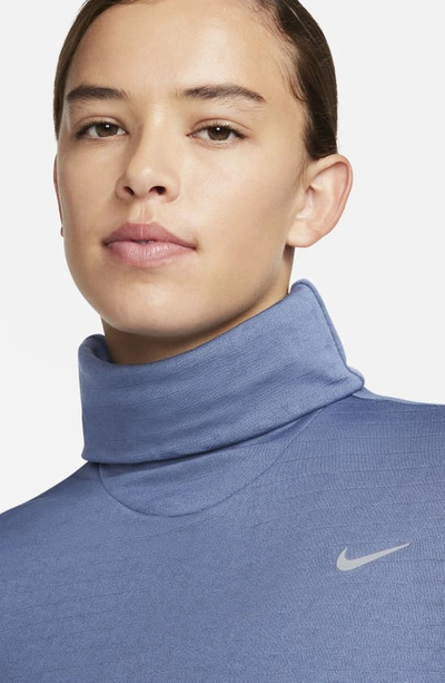 Shop Nike Swift Element Therma-fit Turtleneck Sweatshirt In Diffused Blue
