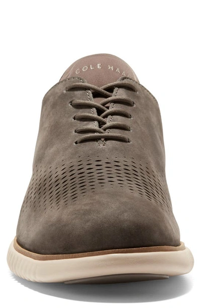 Shop Cole Haan 2.zerogrand Laser Wingtip Shoe In Ch Deep Olive Nubuck/ C