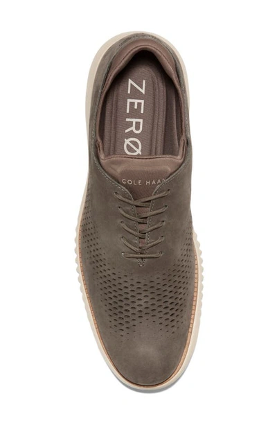 Shop Cole Haan 2.zerogrand Laser Wingtip Shoe In Ch Deep Olive Nubuck/ C