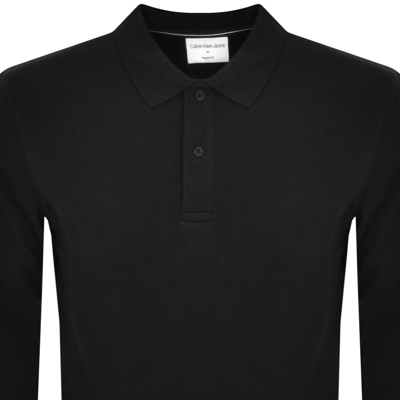 Shop Calvin Klein Jeans Long Sleeve Polo T Shirt Black
