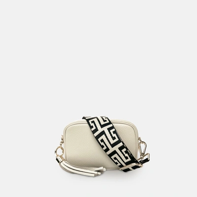 Shop Apatchy London The Mini Tassel Stone Leather Phone Bag With Black & Stone Maze Strap In White