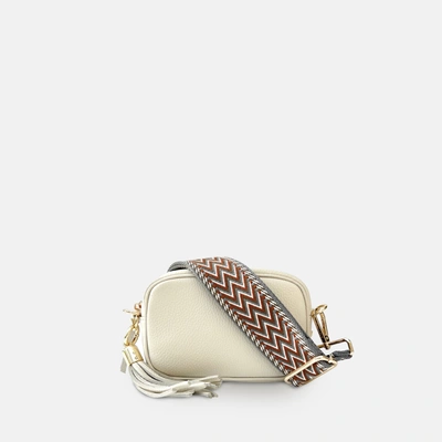 Shop Apatchy London The Mini Tassel Stone Leather Phone Bag With Tan Boho Strap In White