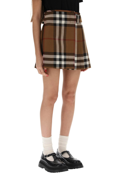 Shop Burberry Exaggerated Check Pleated Wool Mini Skirt Women In Brown