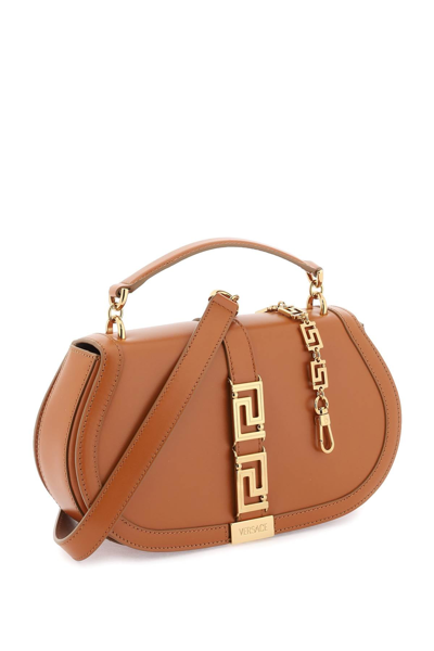 Shop Versace 'greca Goddess' Shoulder Bag Women In Brown