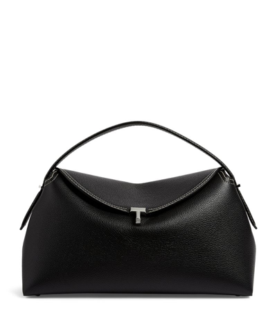 Shop Totême Leather T-lock Top-handle Bag In Black