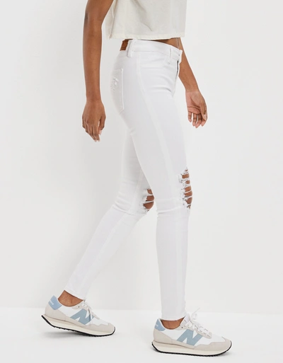 Shop American Eagle Outfitters Ae Next Level Ripped High-waisted Jegging In White