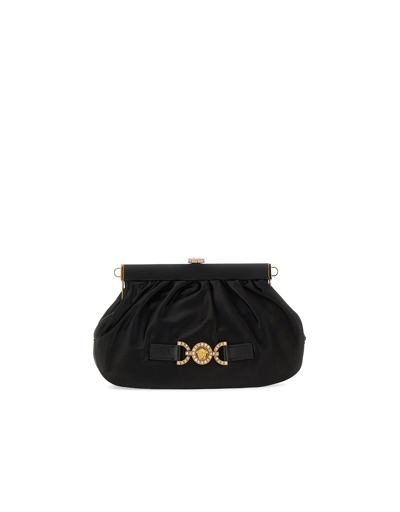 Shop Versace Designer Handbags Clutch With Medusa Plaque In Noir