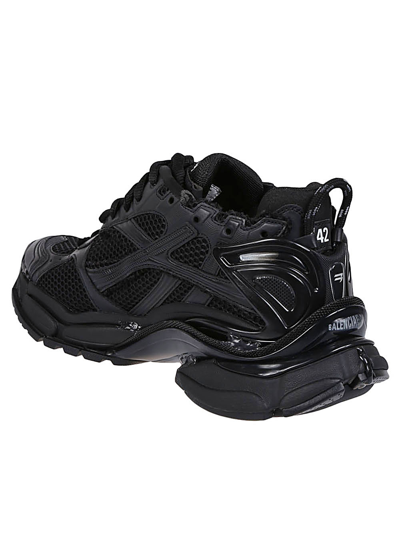 Shop Balenciaga Runner Sneakers In Black