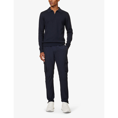 Shop Arne Men's Navy Tapered-leg Mid-rise Stretch-woven Trousers