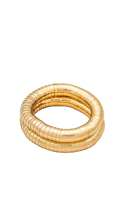 Shop Ettika Bend Bracelet Set In Metallic Gold