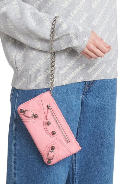 Shop Balenciaga Cagole Leather Wristlet Pouch In Sweet Pink