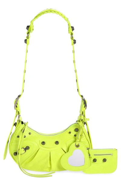 Shop Balenciaga Extra Small Le Cagole Lambskin Shoulder Bag In Fluo Yellow