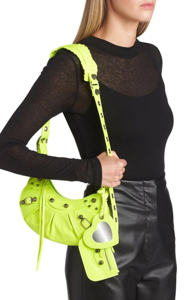 Shop Balenciaga Extra Small Le Cagole Lambskin Shoulder Bag In Fluo Yellow
