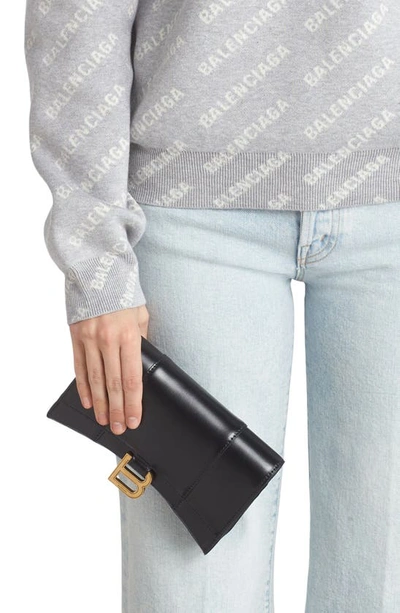 Shop Balenciaga Hour Wallet W/chain In Black