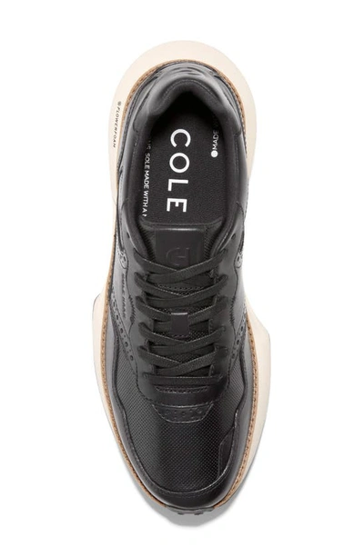 Shop Cole Haan Grandpro Ashland Sneaker In Black/ Ivory