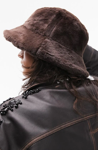 Shop Topshop Faux Fur Bucket Hat In Brown