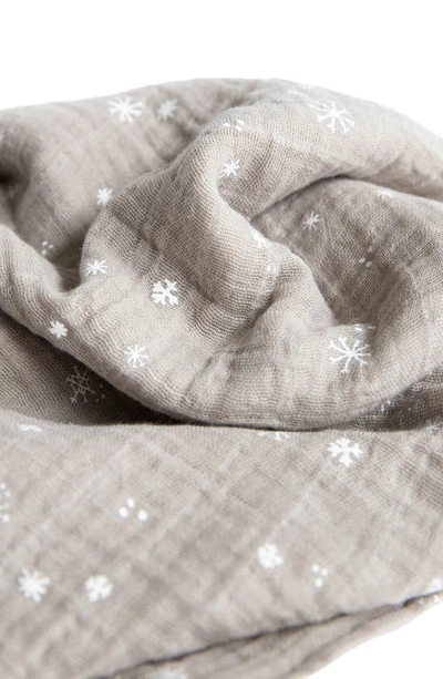 Shop Little Unicorn Cotton Muslin Swaddle Blanket In Snow Flurries