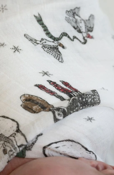 Shop Little Unicorn Cotton Muslin Swaddle Blanket In Snow Day
