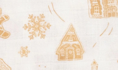 Little Unicorn Cotton Muslin Swaddle Blanket In Gingerbread Village