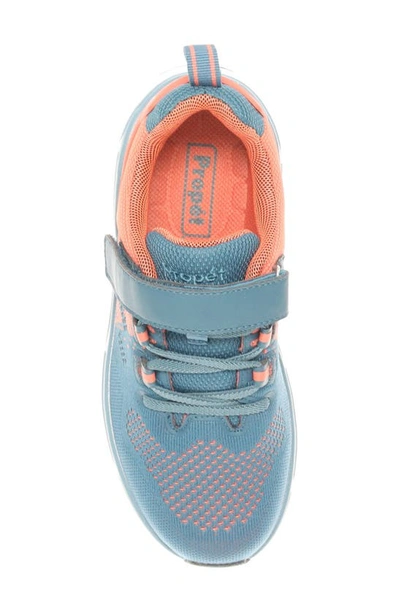 Shop Propét Ultra Fx Walking Sneaker In Teal/ Coral