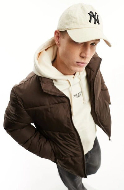 Shop Asos Design Puffer Jacket In Brown