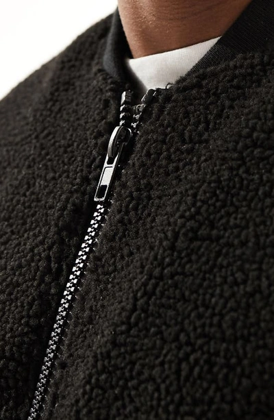 Shop Asos Design Oversize High Pile Fleece Bomber Jacket In Black