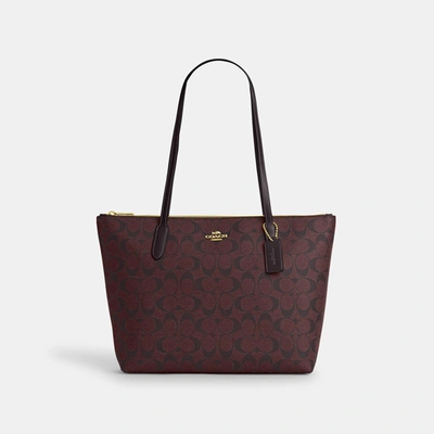 Shop Coach Outlet Zip Top Tote In Signature Canvas In Multi