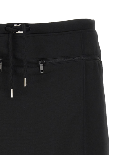 Courrèges Logo-patch Drawstring-waist Miniskirt In Black