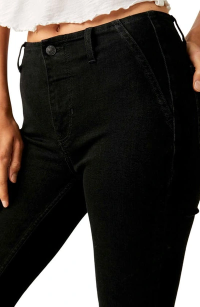 Shop Free People Level Up Side Slit Bootcut Jeans In Pitch Black