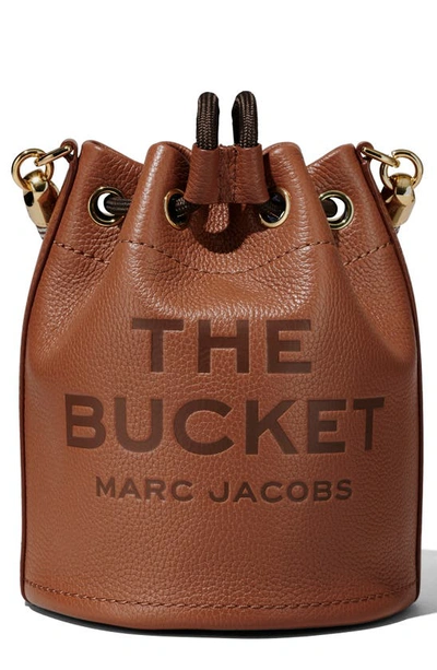 Marc Jacobs 'the Bucket' Brown Crossbody Bag With Embossed Logo On The Front In Argan Oil