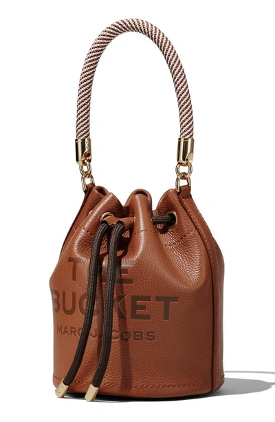 Marc Jacobs 'the Bucket' Brown Crossbody Bag With Embossed Logo On The Front In Argan Oil