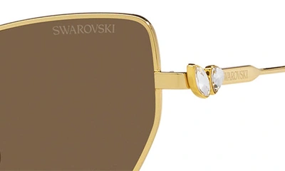 Shop Swarovski 56mm Irregular Sunglasses In Gold