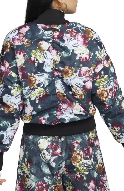 Shop Nike Therma-fit Oversize Reversible Floral Bomber Jacket In Night Maroon/ Deep Jungle