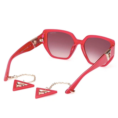 Shop Guess Sunglasses In Pink