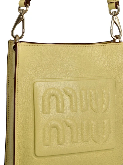 Shop Miu Miu Handbags In Yellow