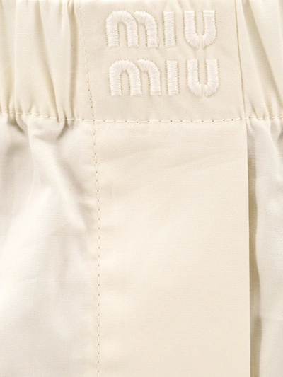 Shop Miu Miu Woman Shorts Woman Beige Shorts In Cream