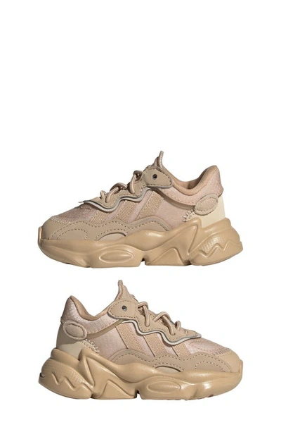 Shop Adidas Originals Kids' Ozweego Sneaker In Magic Beige/ Sand Strata