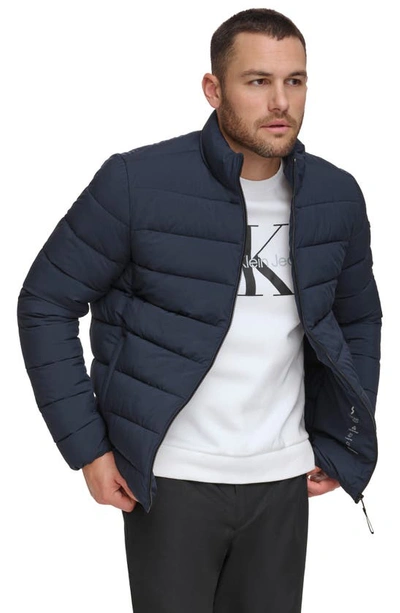 Shop Calvin Klein Stretch Puffer Jacket In True Navy