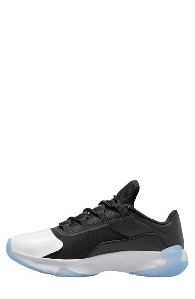 Shop Jordan Air  11 Cmft Low Sneaker In Black/ Metallic Gold/ White