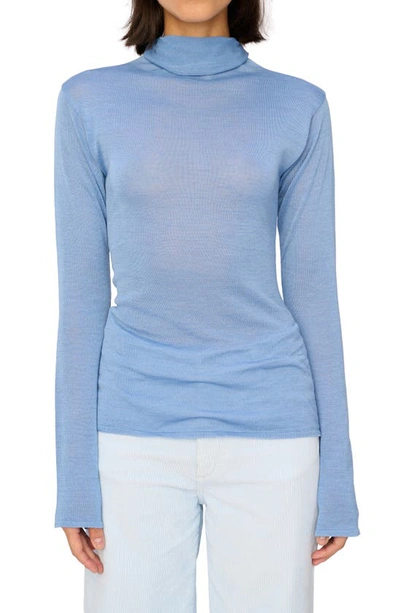 Shop Dl1961 Semisheer Bell Sleeve Turtleneck Top In Powder Blue (knit)