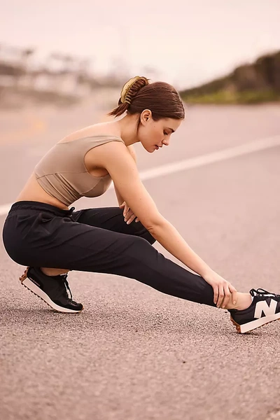 Shop Beyond Yoga Heather Rib Street Joggers Pants In Black